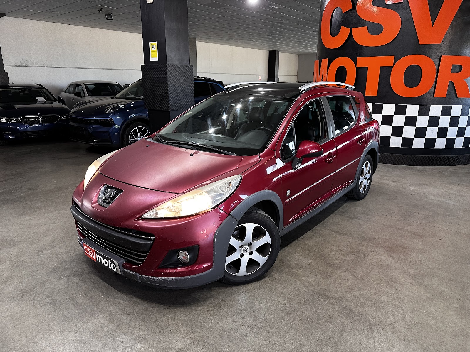 Foto 3 de Peugeot 207 2010 en venta en CSV Motor VALDEFUENTES · color Rojo Metalizado