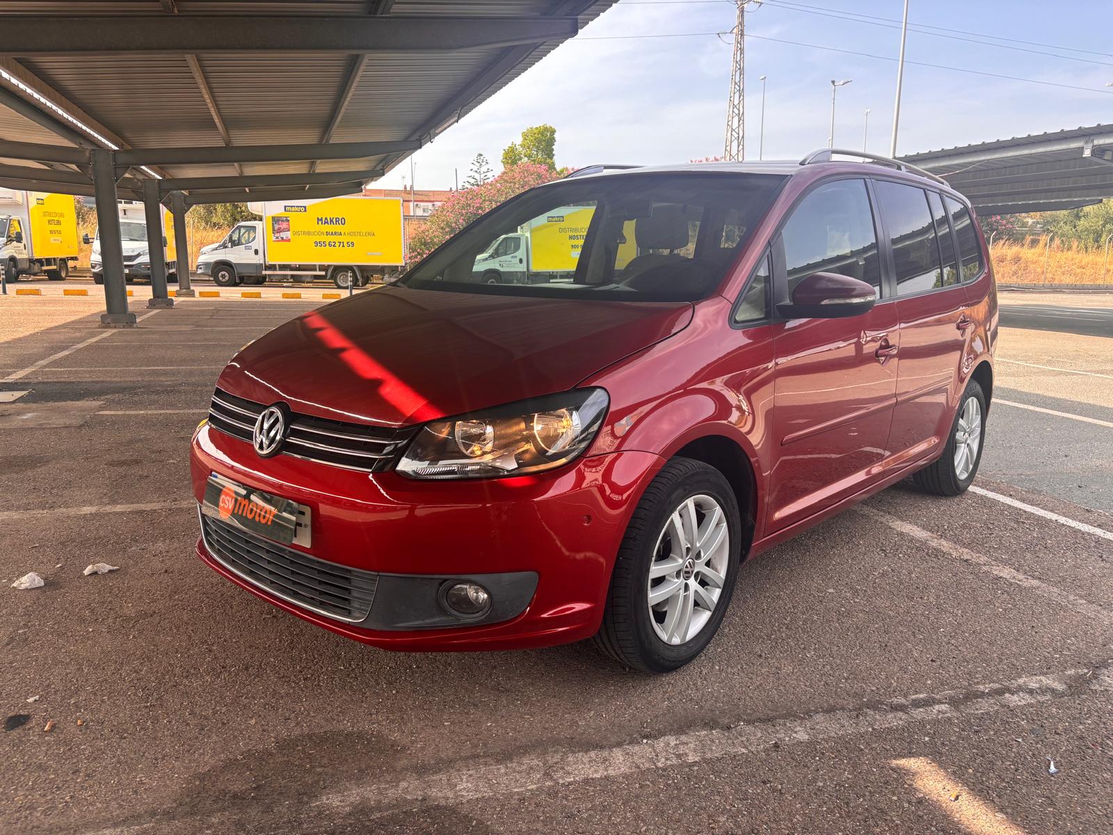 Foto 1 de Volkswagen Touran 2015 en venta en CSV Motor SEVILLA · color Rojo